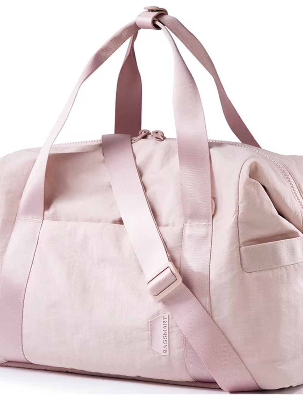 Lightweight Travel Tote. New with tags. Comes in your choice of pink or cream.